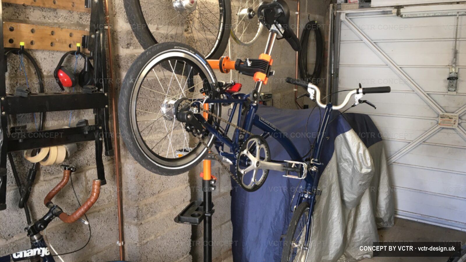 The PW Cycles workshop with a bike in the repair stand