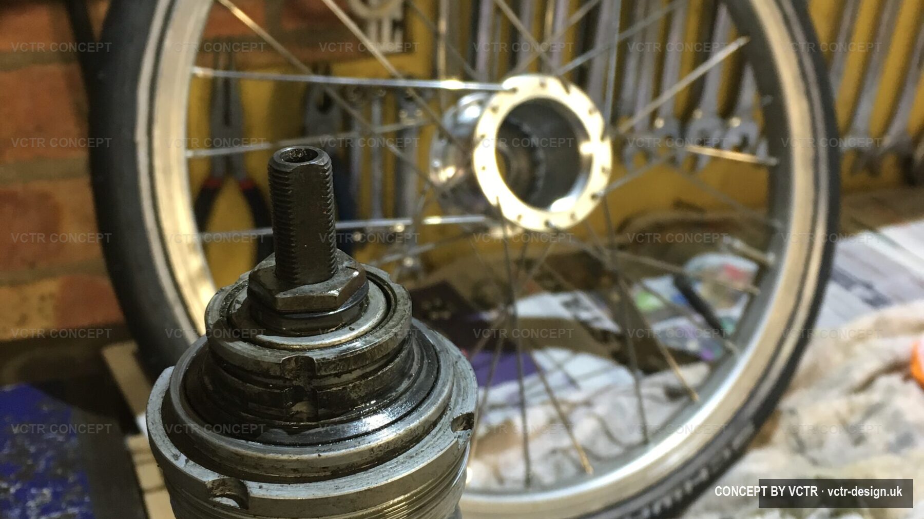 A wheel and hub being worked on at the bench